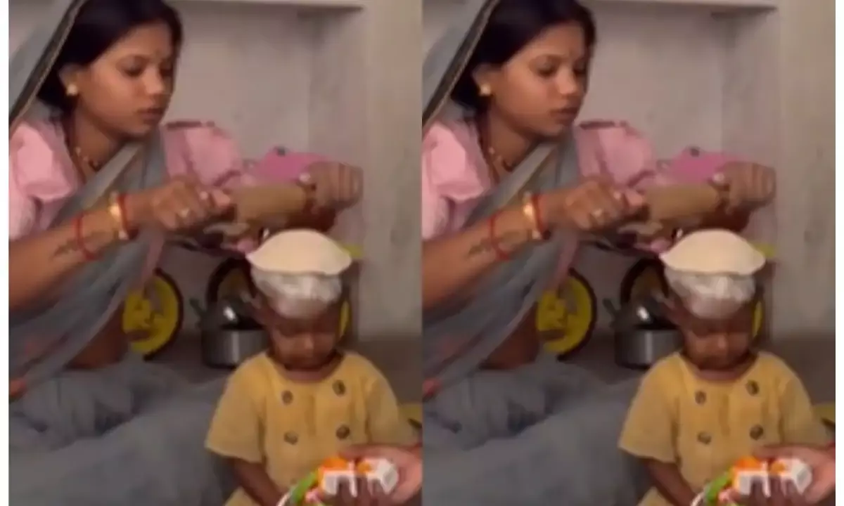 बच्चे के टकले सिर पर मां ने बेल दी रोटी