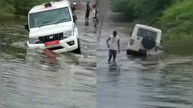 पानी के बहाव में फंसी तहसीलदार की गाड़ी, सवार थे 6 अधिकारी; बड़ा हादसा टला