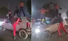 नोएडा में बीच सड़क हुड़दंग, चलती कार की छत पर युवकों का डांस, 67 हजार का चालान