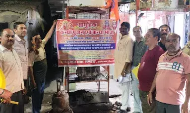 हनुमान भक्त मण्डल द्वारा सामूहिक कन्या पूजन एवं भोज के पोस्टर का विमोचन